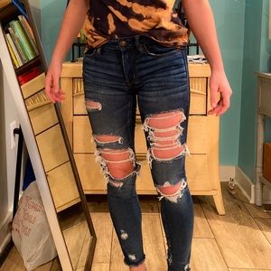 American eagle ripped blue jeans dark wash